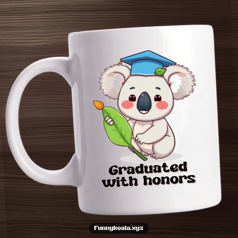 Funny graduation koala mug with a tiny cap, waving a eucalyptus leaf in celebration of achievement.