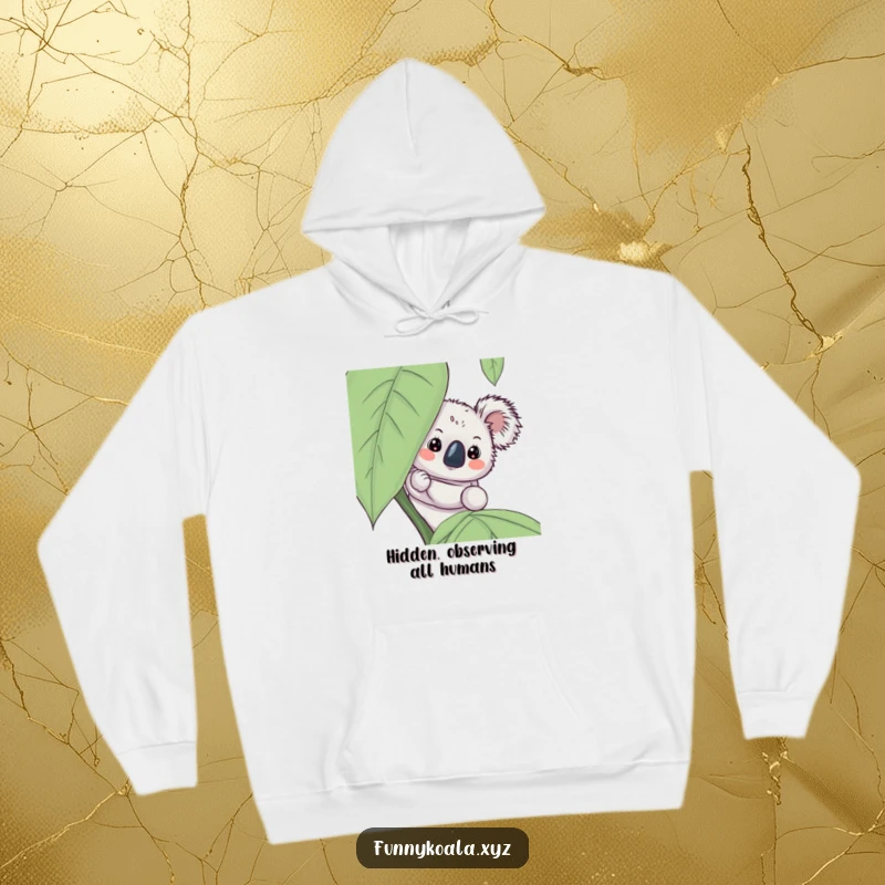 Funny koala hoodie featuring a charming koala peeking out from behind a big leaf, exuding curiosity and comfort for cozy days.