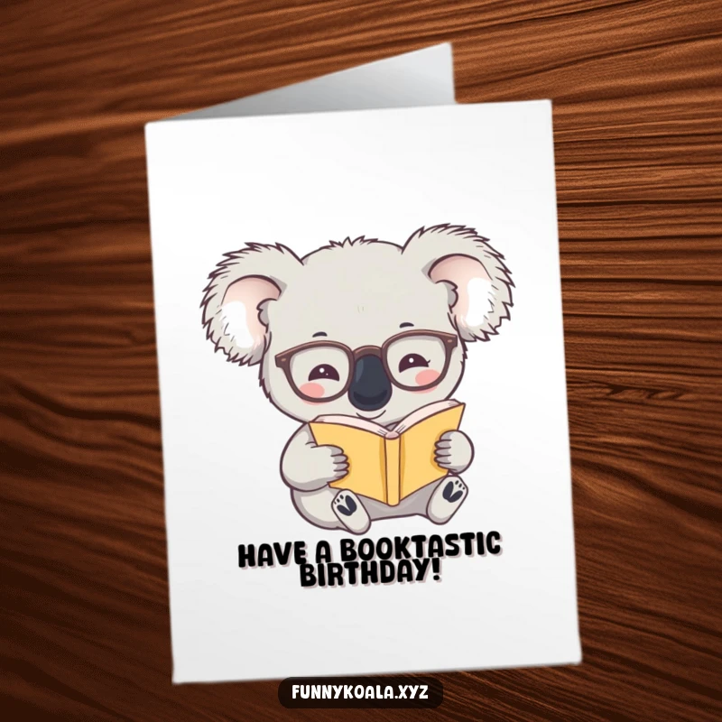 Funny free printable birthday card featuring a koala wearing spectacles, engrossed in reading a tiny book, celebrating a birthday.