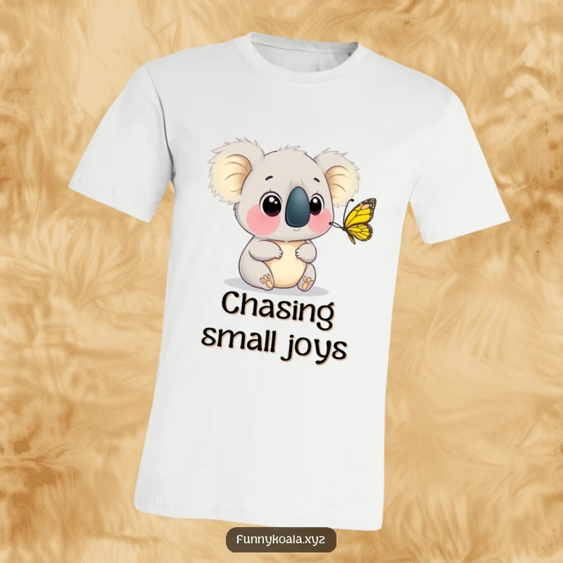 Funny Koala Butterfly T-Shirt with a koala's wide eyes watching a butterfly flutter past its nose, capturing a moment of awe. Excellent funny gift.