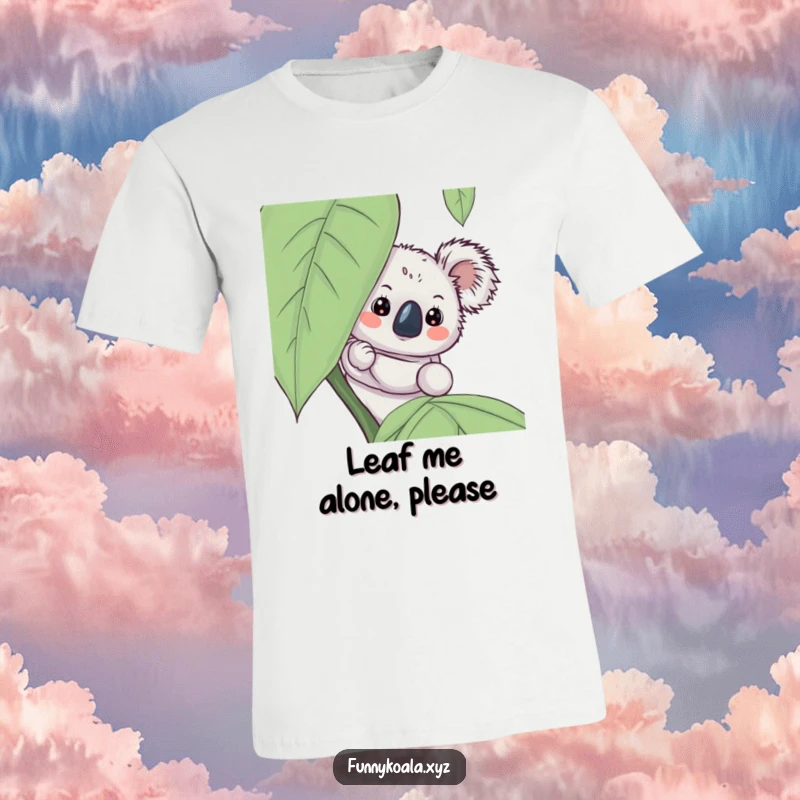 Funny koala t-shirt with a curious koala character peeking playfully from behind a large green leaf, highlighting its inquisitive nature.